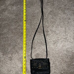 Vintage Y2K Roxy Black Crossbody Bag with Gold Accents and Built in Mirror.